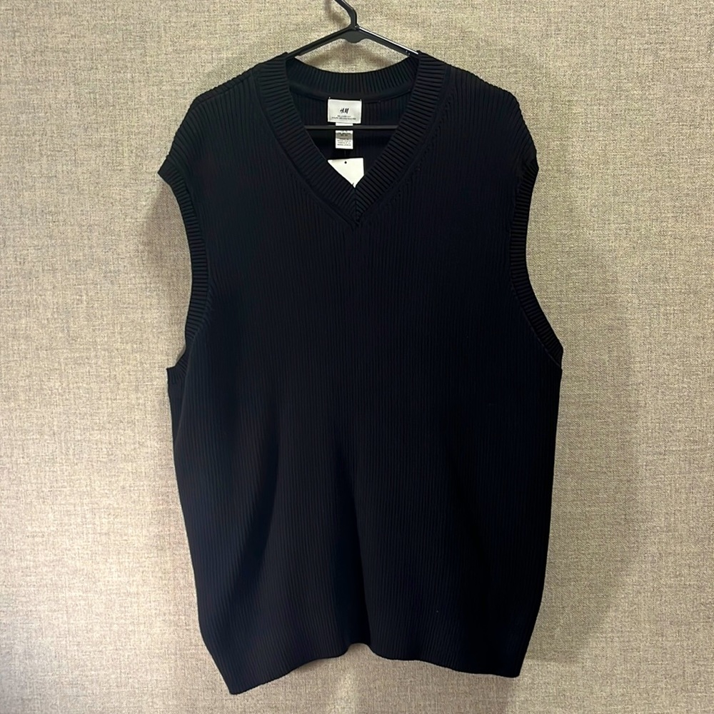 Black relaxed fit cotton sweater vest.